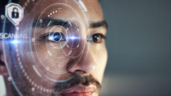 Asian man, scanning eye and biometrics for futuristic cyber security on mockup space at the office. Face of male person in future facial recognition for digital access, identification or verification