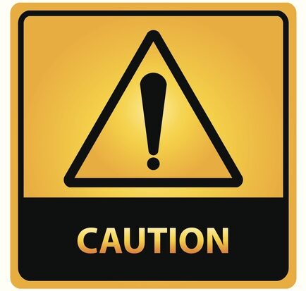 Caution text and sign.