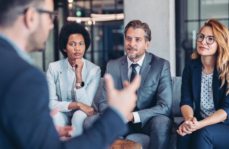 Lawyers gathering in an office for a meeting