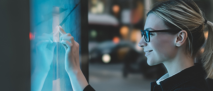 Smiling_female_in_front_of_a_display_S_0934 copy