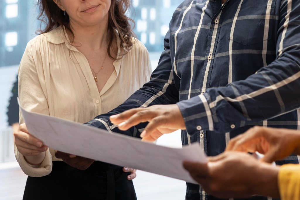 Coworkers looking at a document