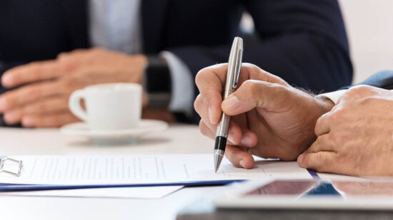 Businessman signing a contract