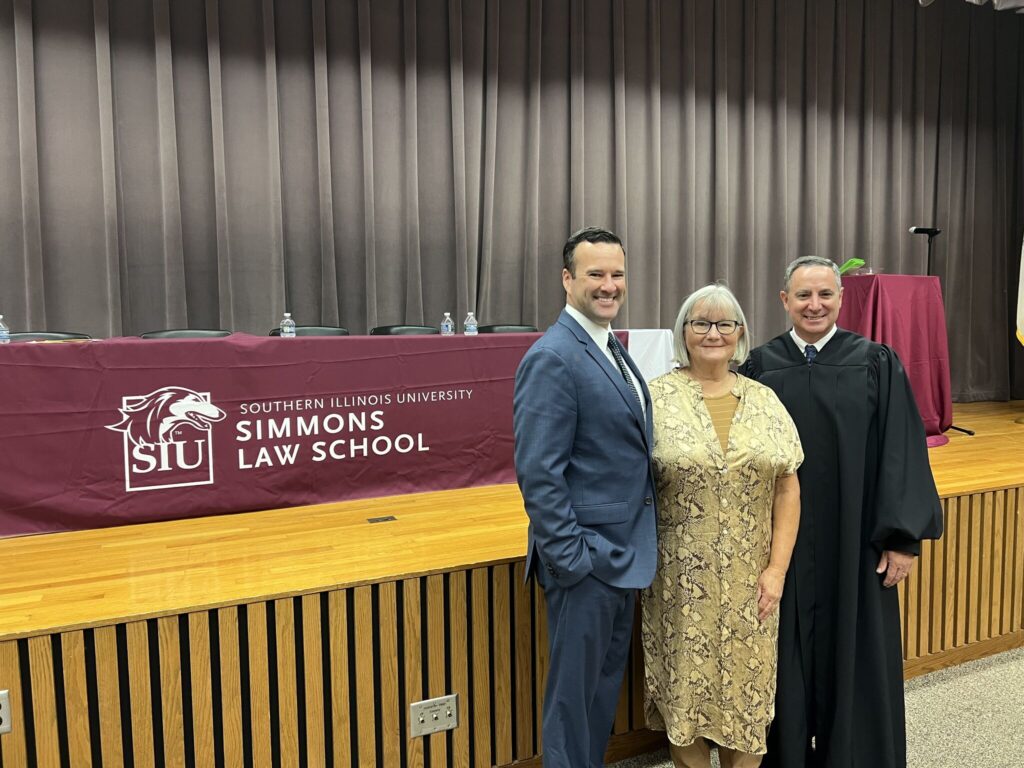Mark Palmer, Kathy Pine, and Illinois Supreme Court Justice David K. Overstreet at a professionalism orientation for the Southern Illinois University Simmons Law School