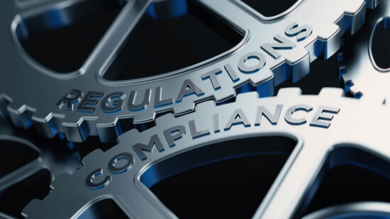 Metal Cogs With Regulations And Compliance Text - Compliance Concept