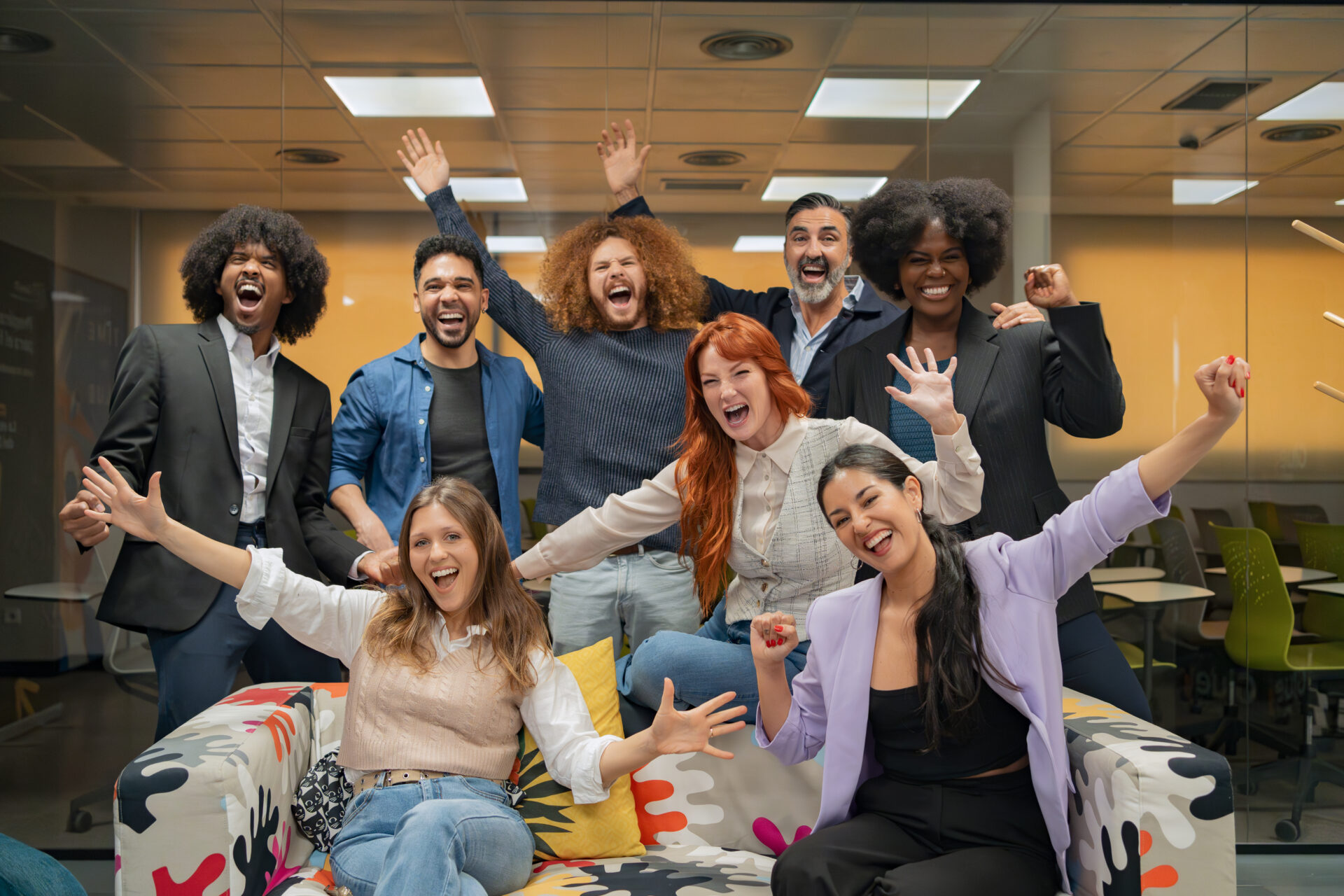 A group of happy employees and their employer during a celebration as they make New Year&rsquo;s resolutions for work to ensure 2026 starts off on the right foot.