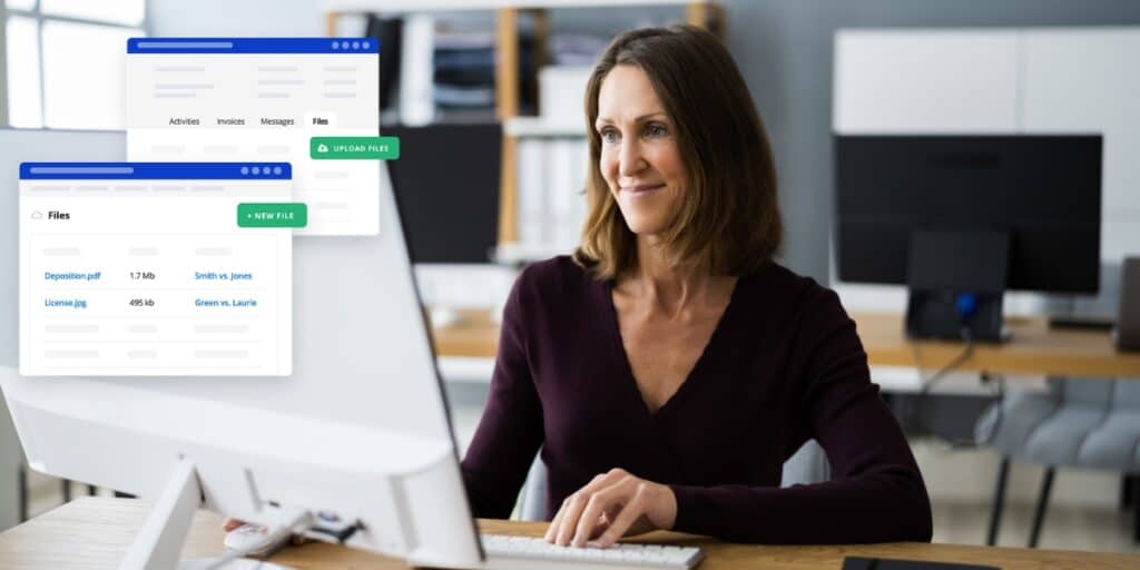 A female lawyer using her desktop computer to look at client files in PracticePanther