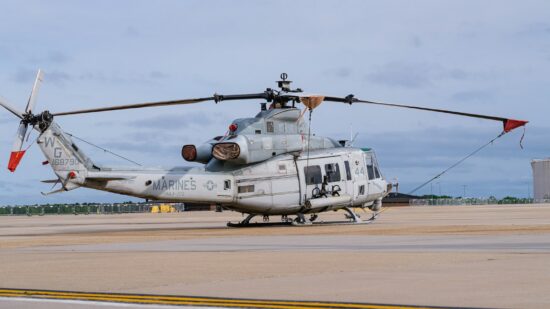 A U.S. Marine Corps Bell UH-1Y Venom helicopter assigned to HMLA-773 sits secured on the flight line at McGuire Air Force Base, New Jersey, following the 2025 Thunderbirds airshow. Date: May 19, 2025 Location: McGuire AFB, New Jersey, USA