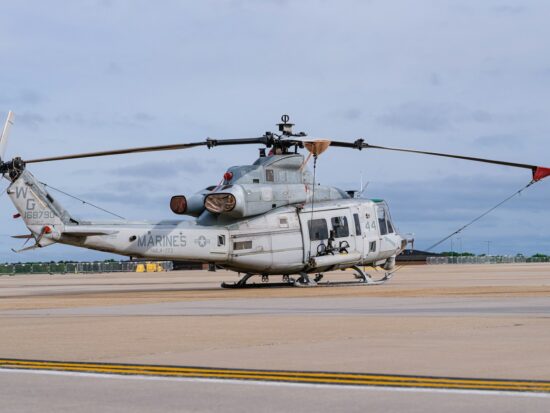 A U.S. Marine Corps Bell UH-1Y Venom helicopter assigned to HMLA-773 sits secured on the flight line at McGuire Air Force Base, New Jersey, following the 2025 Thunderbirds airshow. Date: May 19, 2025 Location: McGuire AFB, New Jersey, USA