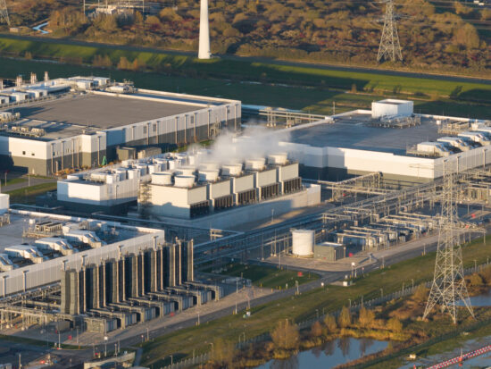 Aerial Vertical View: Massive Data Center Cooling Systems.