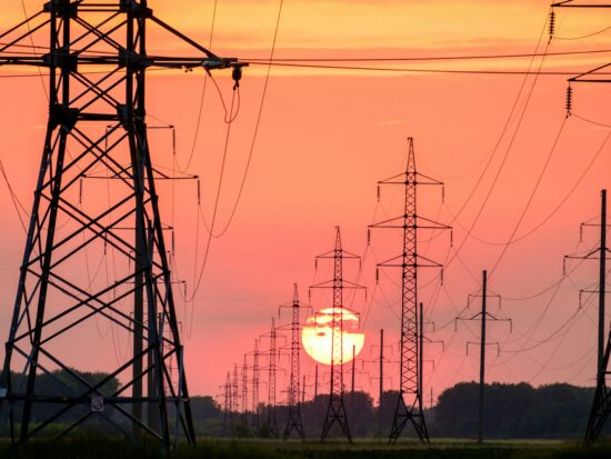 power line NP background of the sunset, a lot of supports for wires