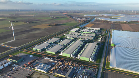 Large scale computing infrastructure, datacenter aerial drone overhead view. Telecommunication server infrastructure.