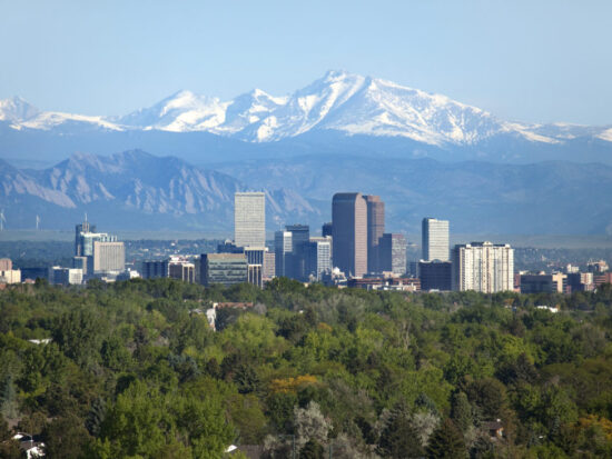 Denver Colorado skyscrapers snowy Longs Peak Rocky Mountains summer
